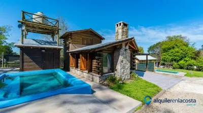 Cabañas con piscina compartida y terraza en Sierra de los Padres